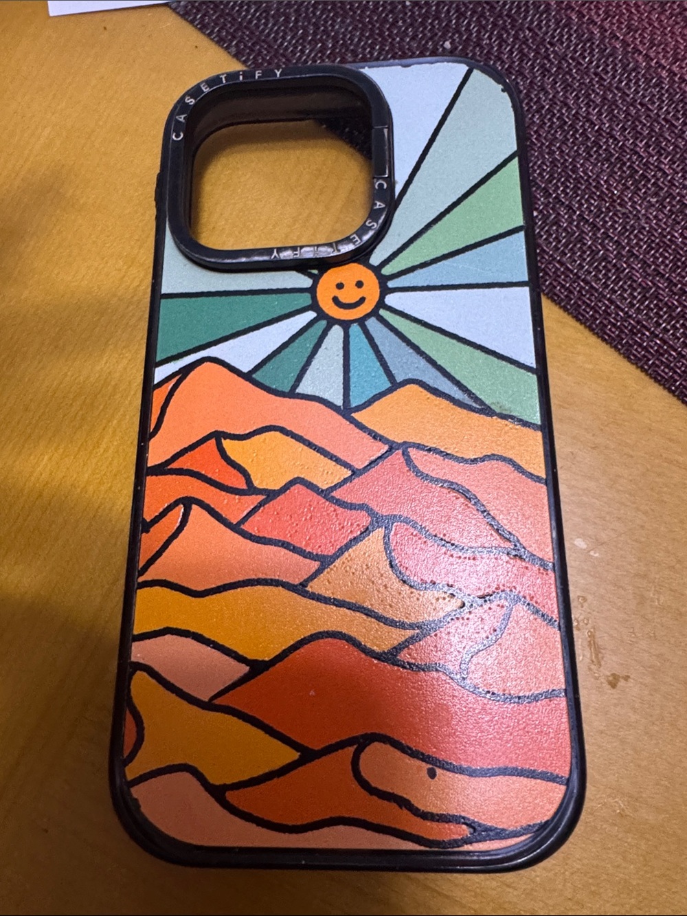 Casetify Orange & Green Smiley Sun Mountain Case for iPhone 15pro